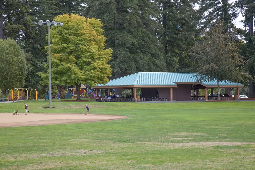 Recreational area with green spaces and seating at Arya at Hedges Creek Apartments
