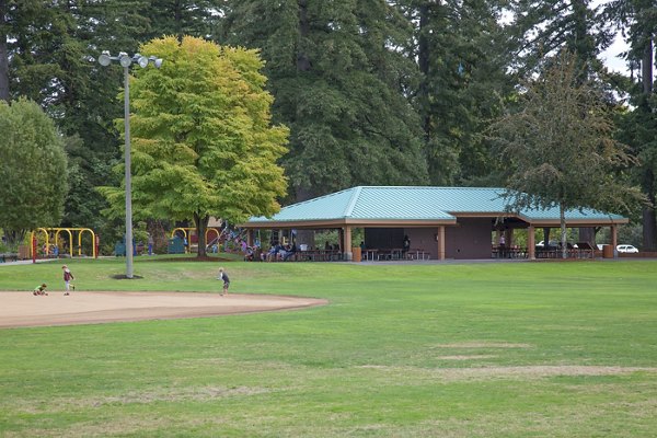 Recreational area with green spaces and seating at Arya at Hedges Creek Apartments