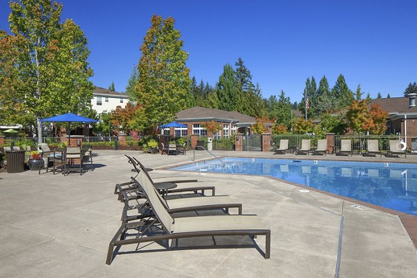 Inviting outdoor pool area at Arya at Hedges Creek Apartments