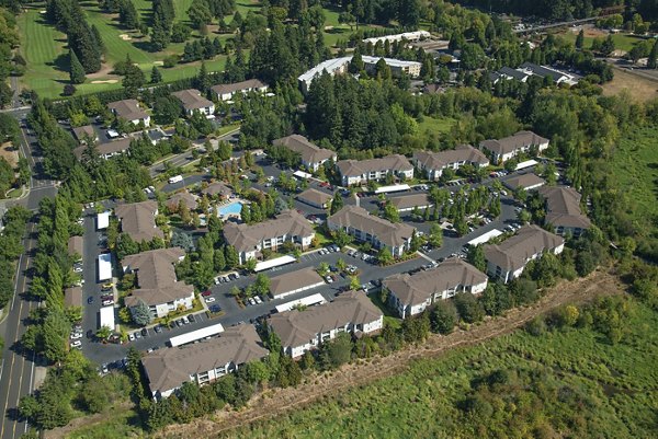 Arya at Hedges Creek: Scenic view of luxury apartments with lush landscaping and modern architecture
