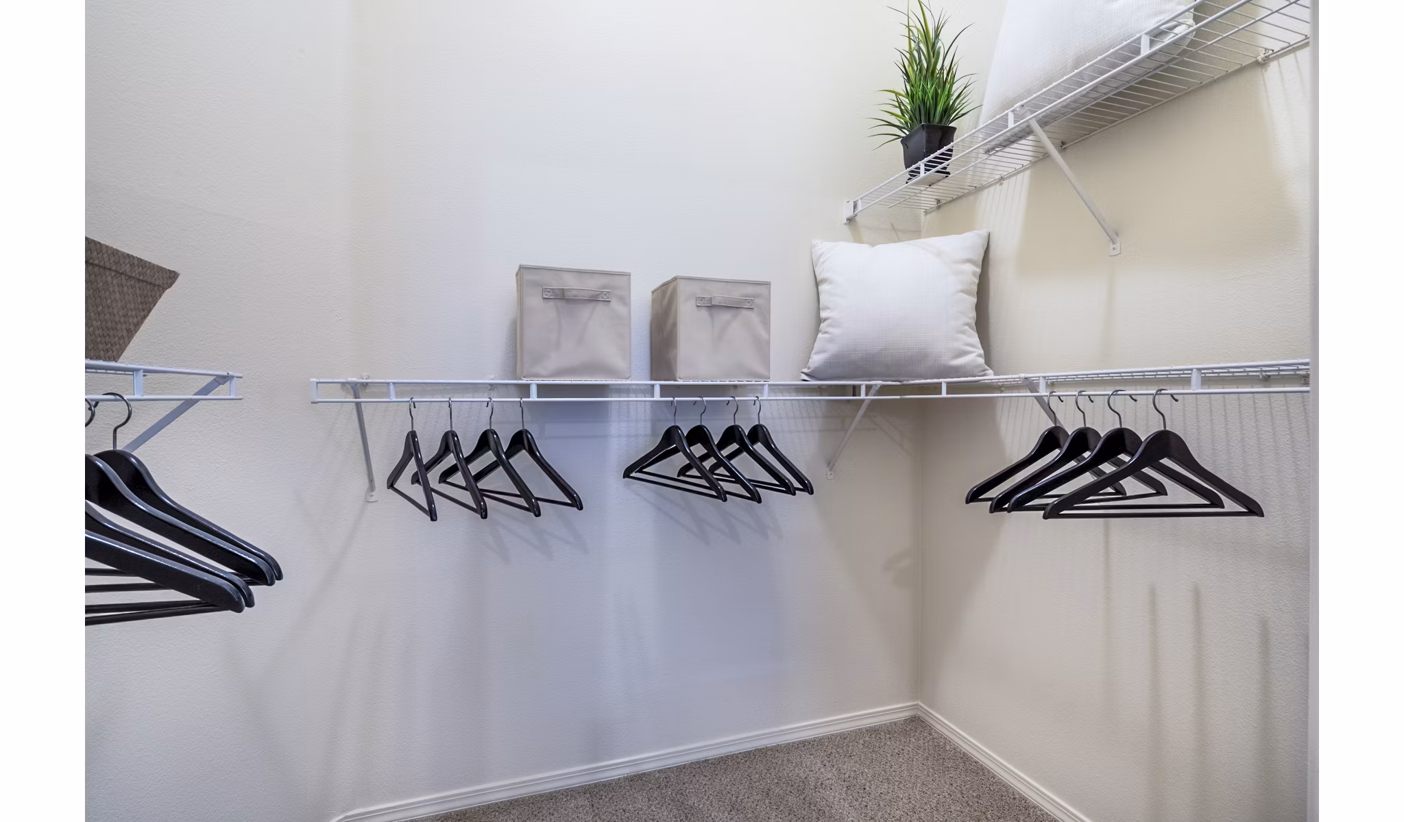 Bedroom featuring modern decor and large windows at Allure Apartments in downtown city Perfect blend of comfort and style in a luxury setting