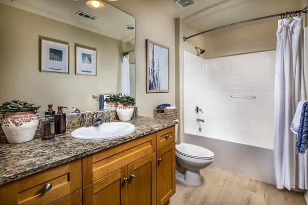 Modern bathroom with sleek fixtures at Allure Apartments, showcasing luxury living in a contemporary design