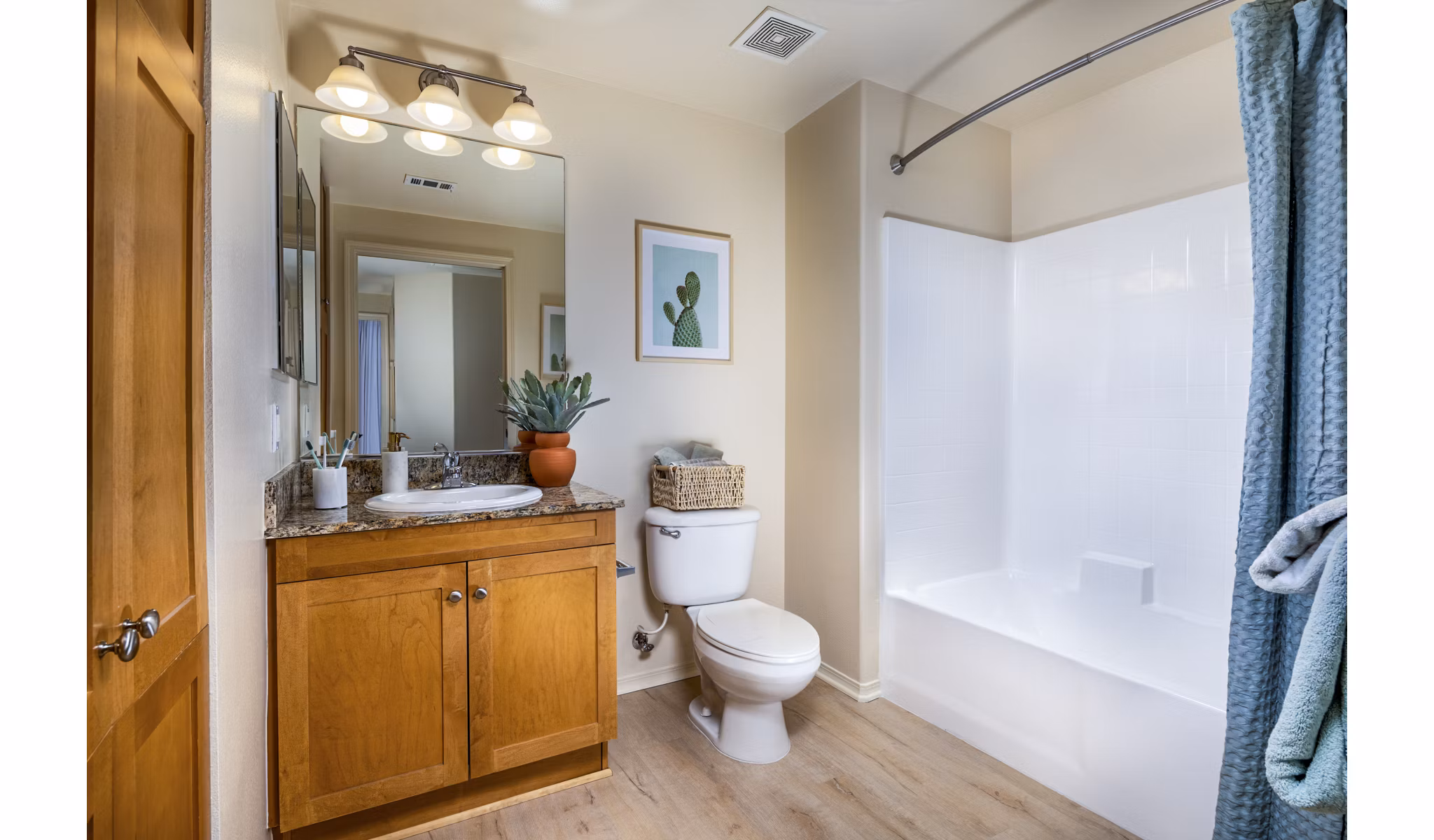 Luxurious bathroom featuring marble countertops and modern fixtures at Allure Apartments, a Greystar luxury property