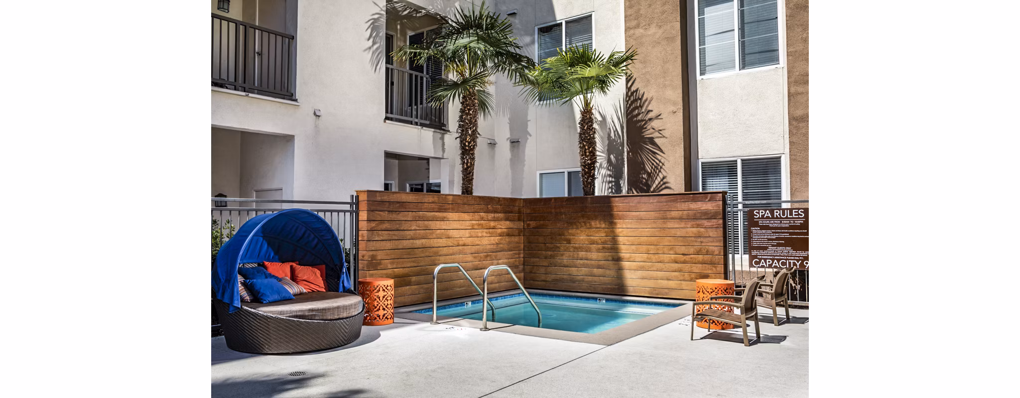 Relaxing hot tub and jacuzzi at Allure Apartments offering resort-style amenities in a serene setting