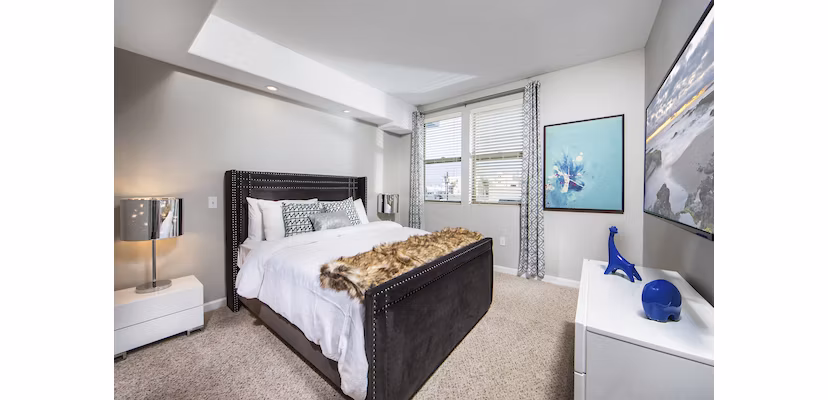 Cozy bedroom with modern decor at Avana on Wilshire Apartments