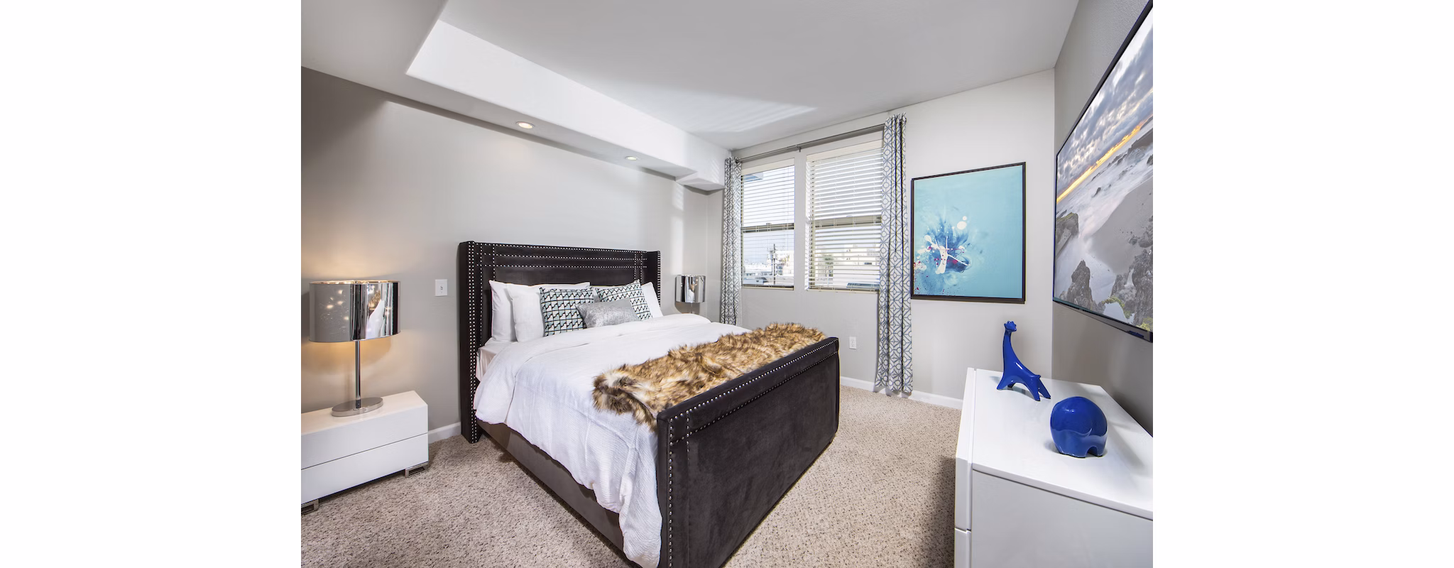 Cozy bedroom with modern decor at Avana on Wilshire Apartments