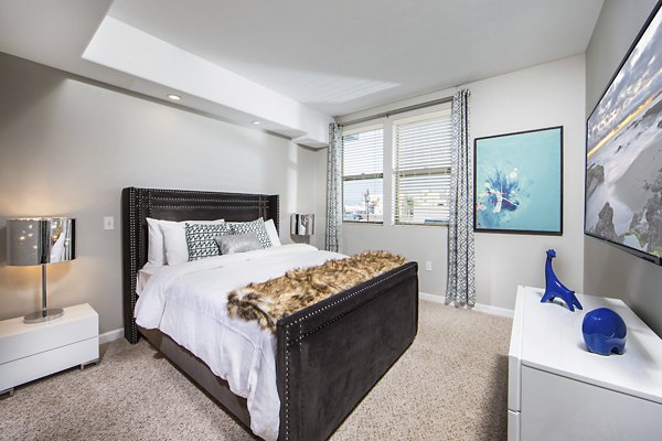 Cozy bedroom with modern decor at Avana on Wilshire Apartments