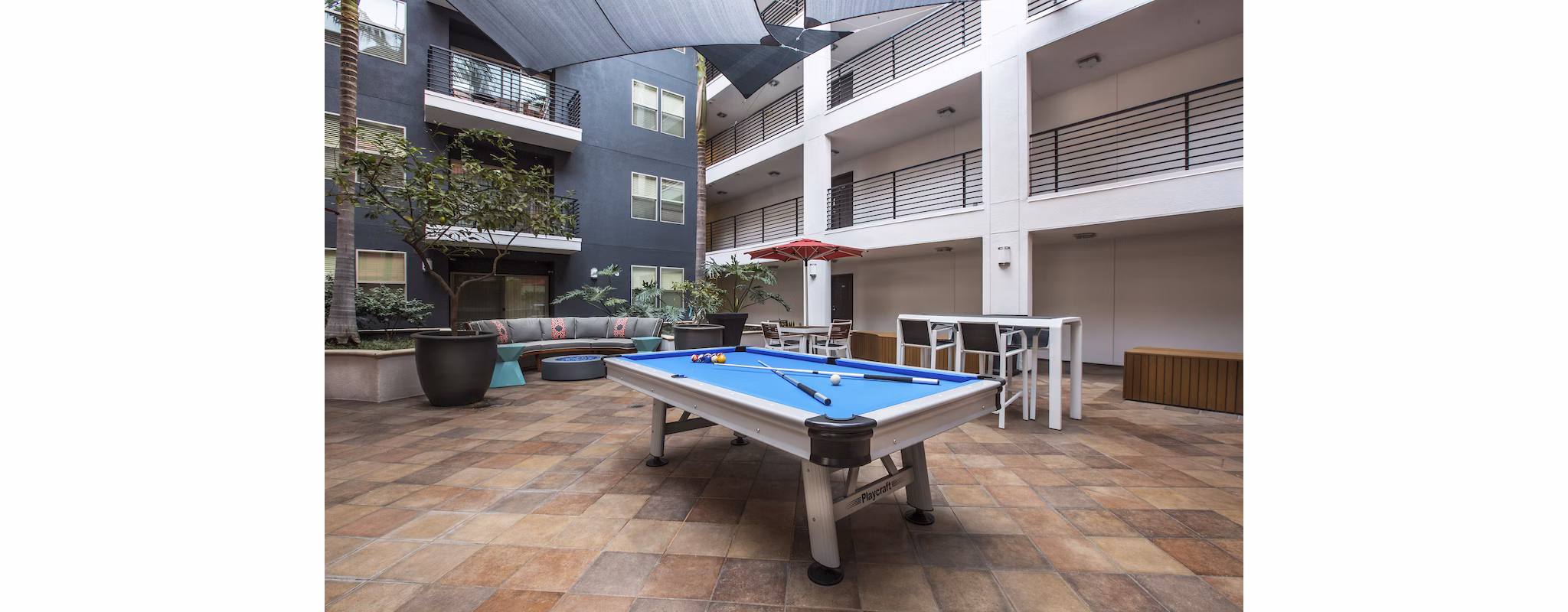 Game room with modern entertainment facilities at Avana on Wilshire Apartments