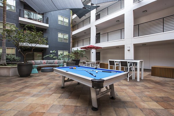 Game room with modern entertainment facilities at Avana on Wilshire Apartments