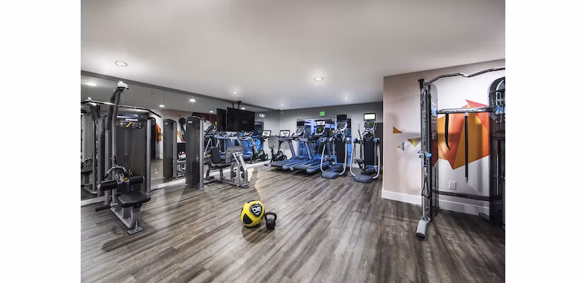State-of-the-art fitness center with modern equipment at Avana on Wilshire Apartments