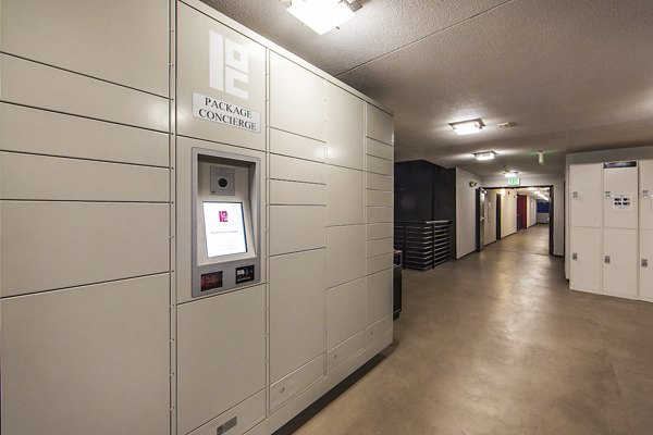 Modern mail room with secure mailboxes at Avana on Wilshire Apartments