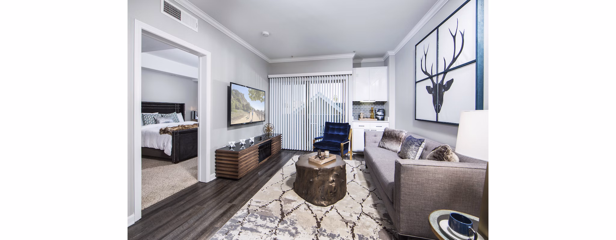 Modern living room with sleek furnishings at Avana on Wilshire Apartments, highlighting luxury urban lifestyle in Los Angeles