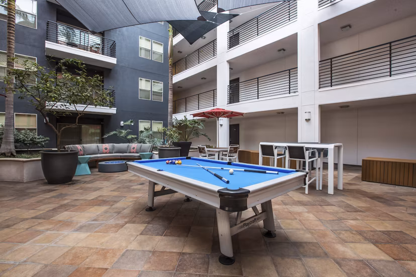 Patio with modern seating at Avana on Wilshire Apartments in Los Angeles, ideal for relaxation and gatherings in a luxury setting
