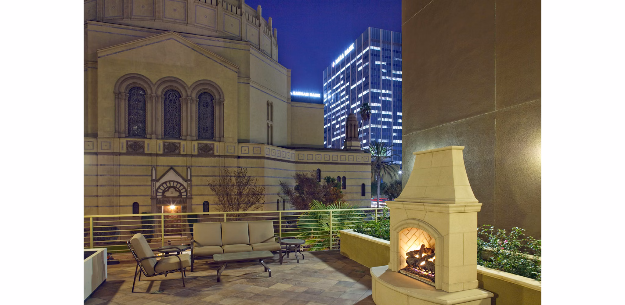 Patio with modern seating at Avana on Wilshire Apartments in Los Angeles, ideal for relaxation and gatherings in a luxury setting