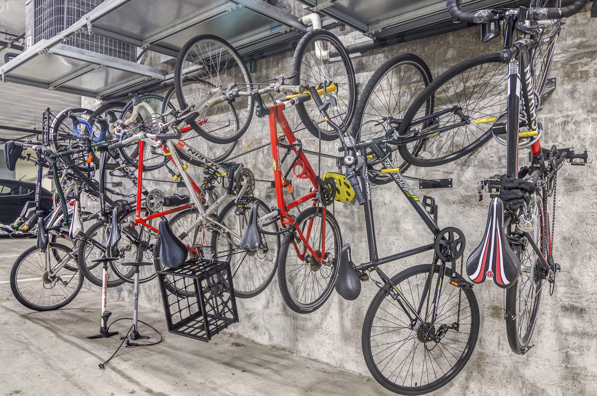 Bicycle storage facility with secure racks at Park 19 Apartments, offering practical solutions for urban cyclists in luxury living environments