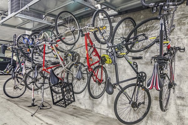 Bicycle storage facility with secure racks at Park 19 Apartments, offering practical solutions for urban cyclists in luxury living environments