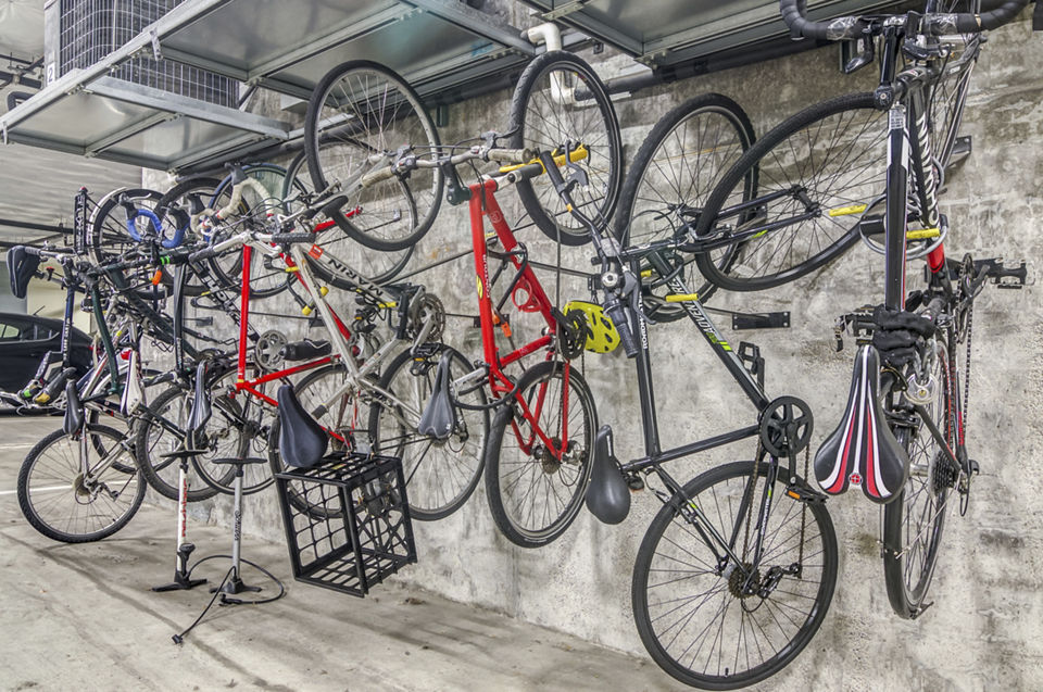 Bicycle storage facility with secure racks at Park 19 Apartments, offering practical solutions for urban cyclists in luxury living environments