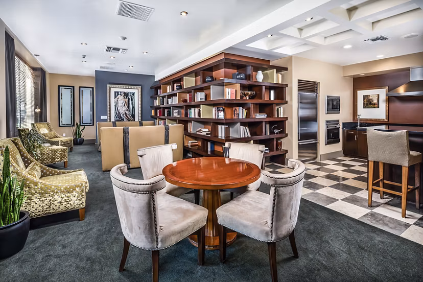 Clubhouse with modern design and cozy seating at Trio Apartments in Greystar luxury community