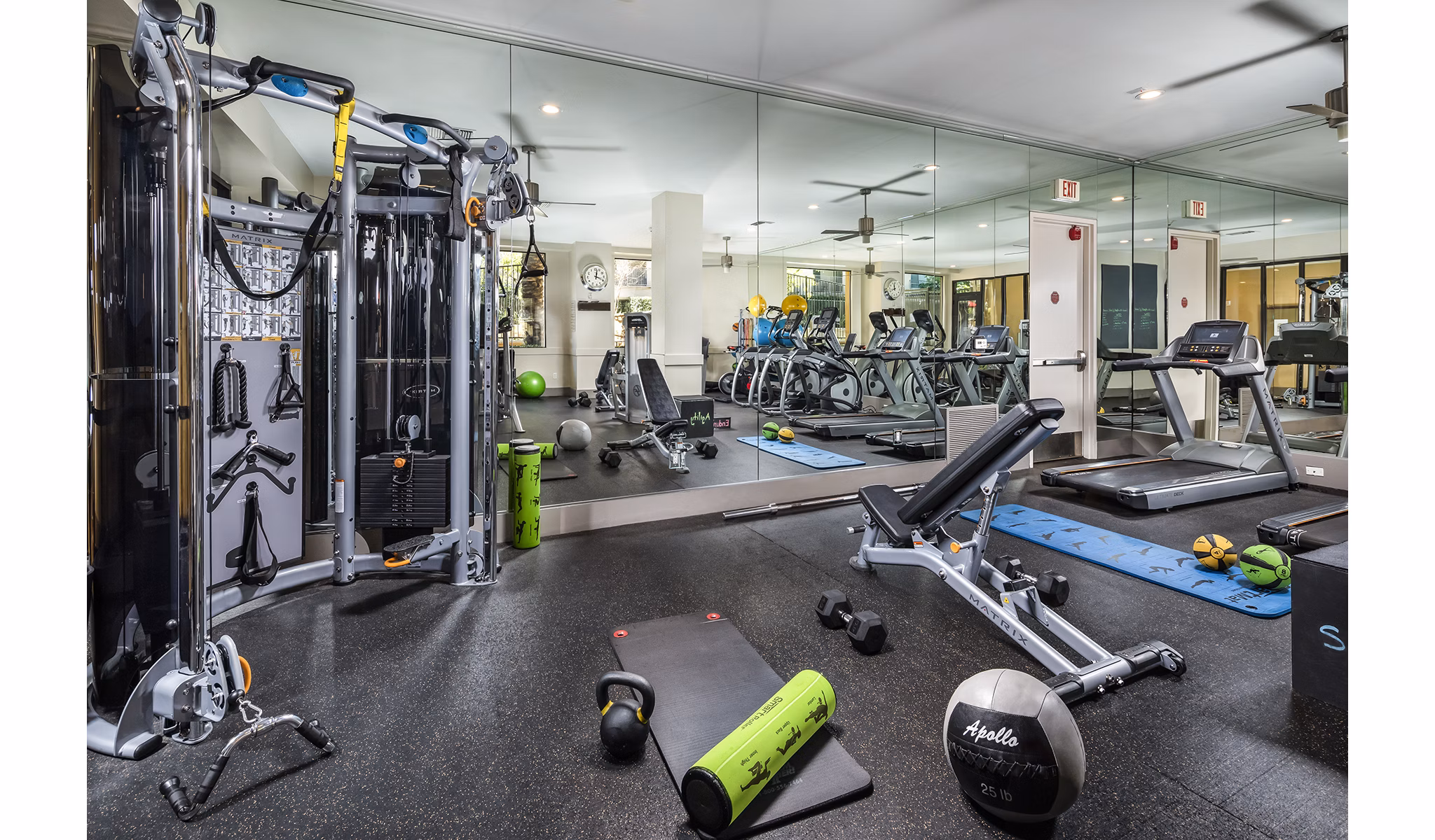 Modern fitness center with state-of-the-art equipment at Trio Apartments for an active lifestyle