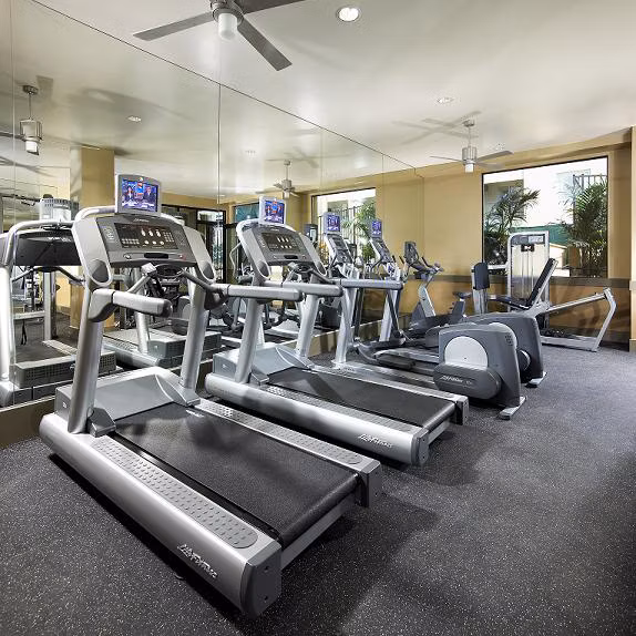 fitness center at Trio Apartments