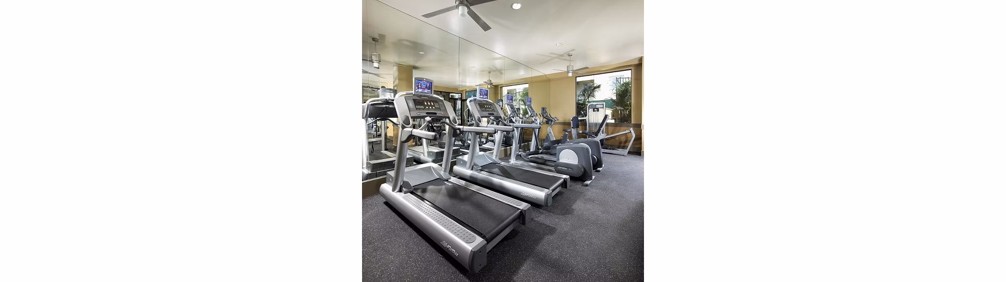 fitness center at Trio Apartments