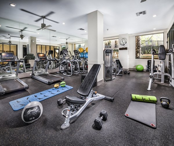 fitness center at Trio Apartments