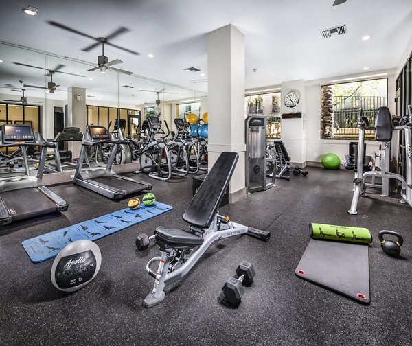 Fitness center with state-of-the-art equipment at Trio Apartments, a Greystar luxury community in a prime location