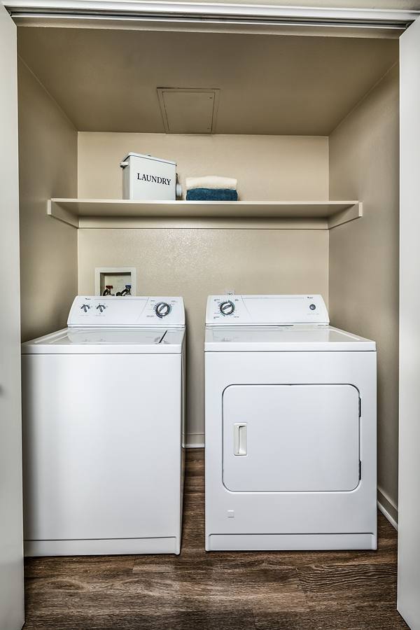 laundry room at Trio Apartments