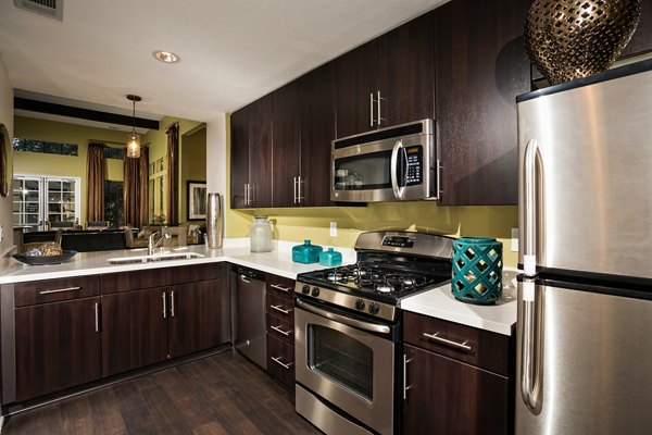 Clubhouse featuring modern decor and large seating area at Westcreek Apartments