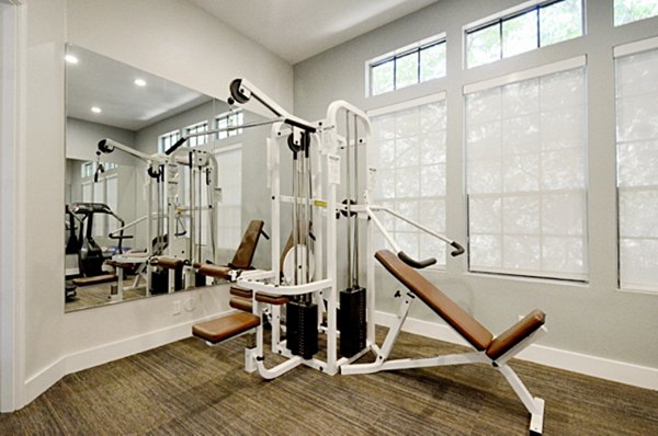 Fitness center with modern equipment at Westcreek Apartments