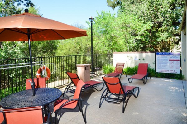 Elegant patio with stylish outdoor seating at Westcreek Apartments, offering a luxurious living experience