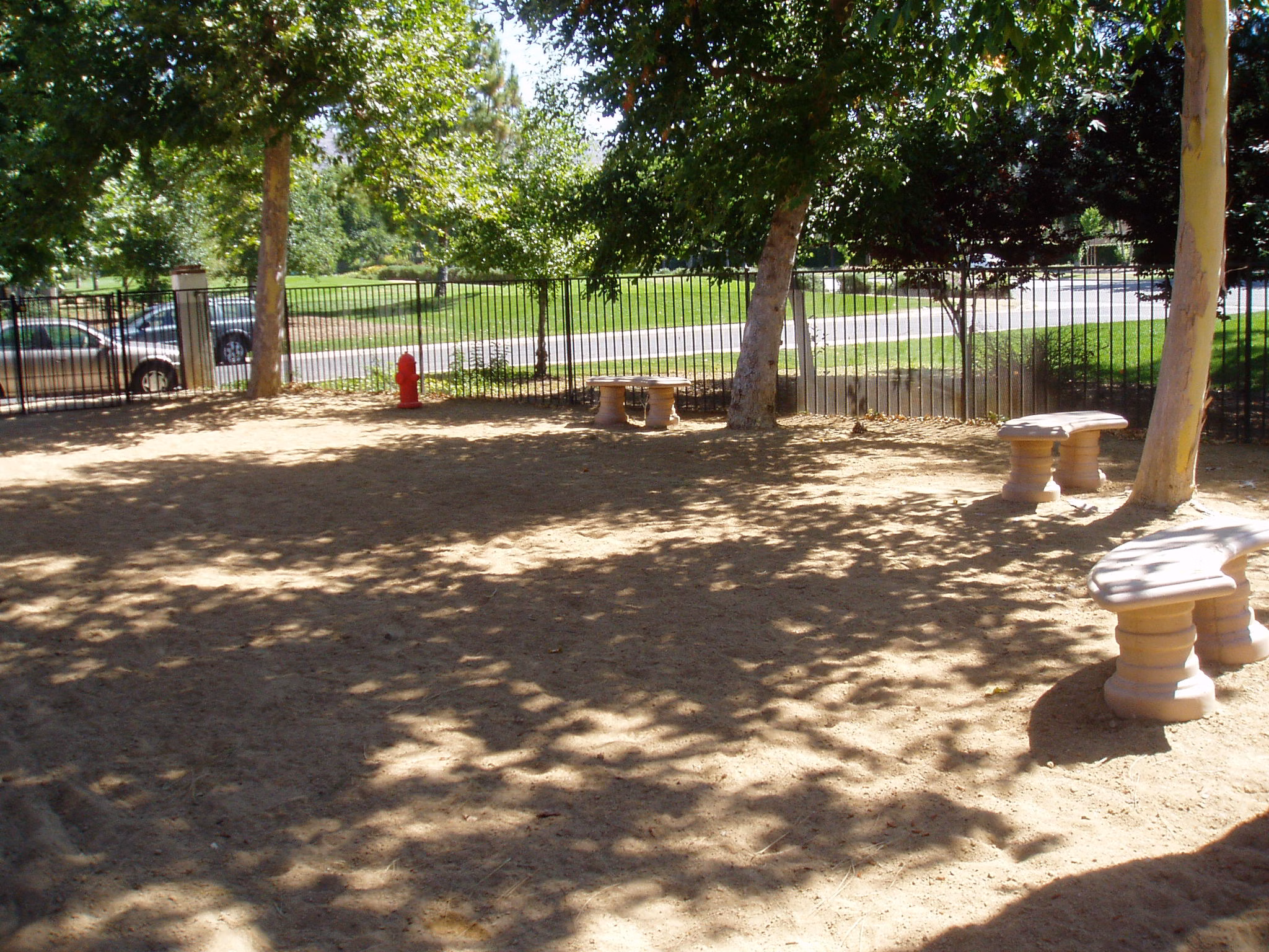 Dog-friendly recreational area with agility equipment at Westcreek Apartments