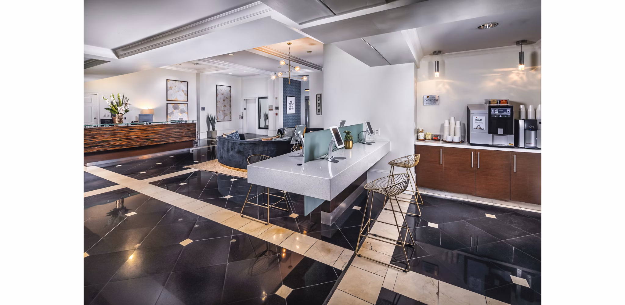 Modern clubhouse lobby with cozy seating at Legacy at Westwood Apartments