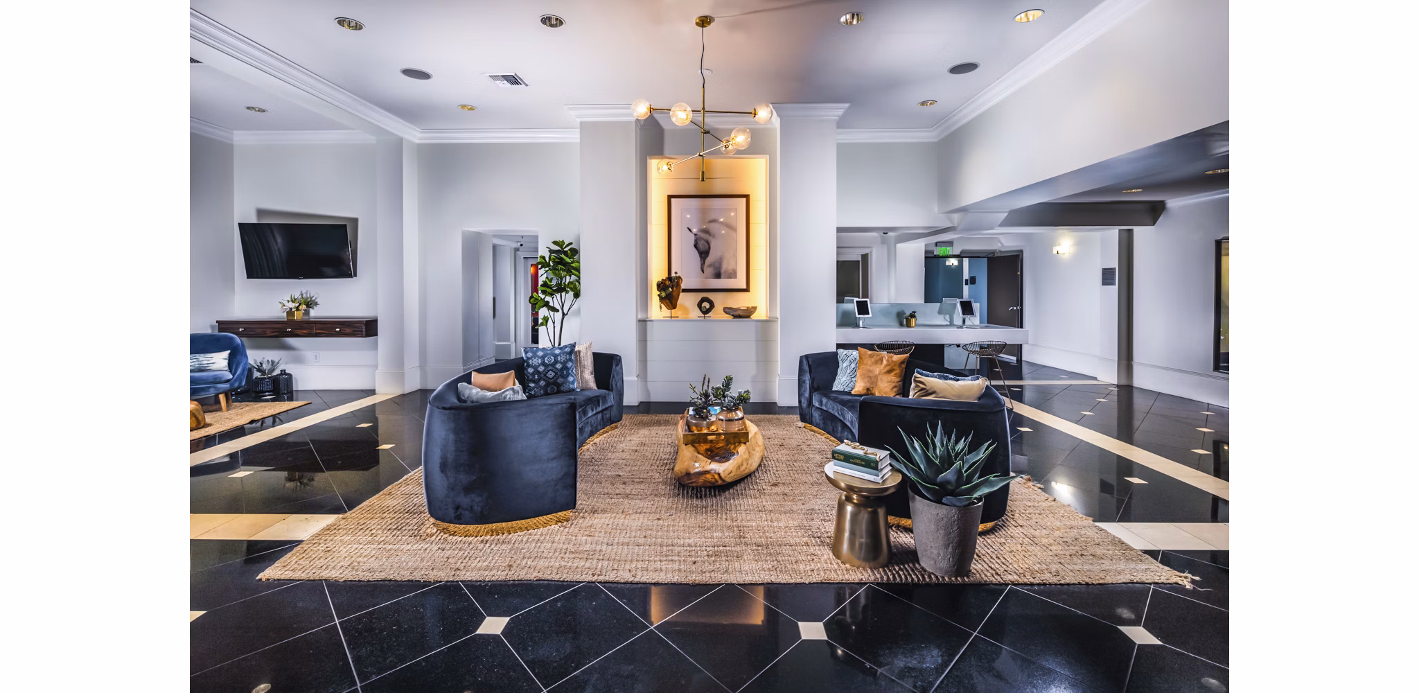 Elegant clubhouse lobby with modern seating and decor at Legacy at Westwood Apartments