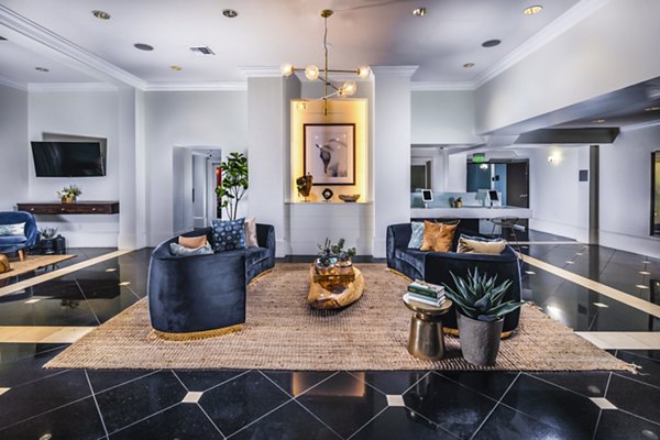Elegant clubhouse lobby with modern seating and decor at Legacy at Westwood Apartments