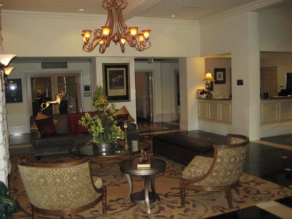 Legacy at Westwood: Modern clubhouse with social spaces and seating areas in luxury apartments Ideal for gatherings and community events