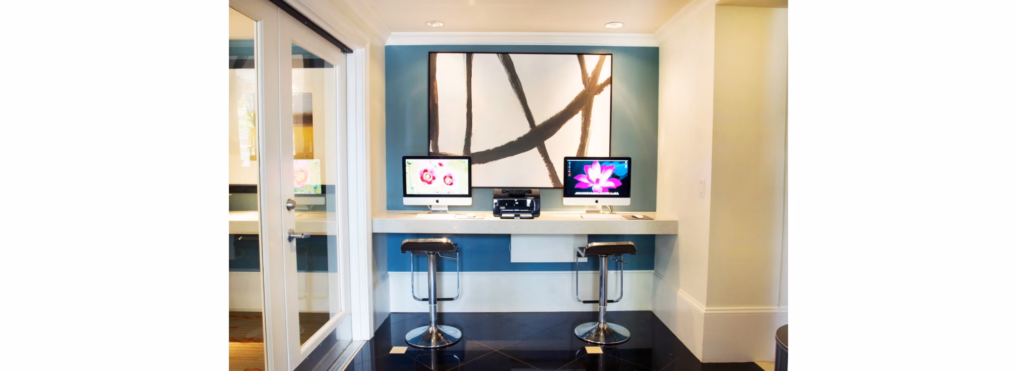 Modern business center with collaborative workspaces at Legacy at Westwood Apartments, offering luxury and convenience in a prime location