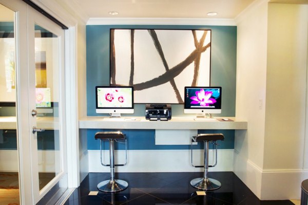 Modern business center with collaborative workspaces at Legacy at Westwood Apartments, offering luxury and convenience in a prime location