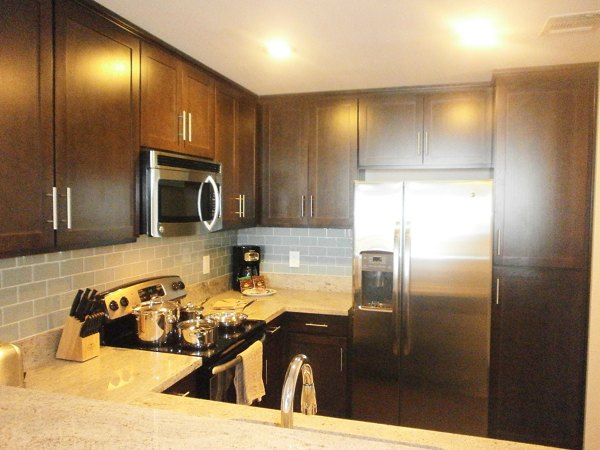 Modern kitchen with stainless steel appliances in Legacy at Westwood Apartments