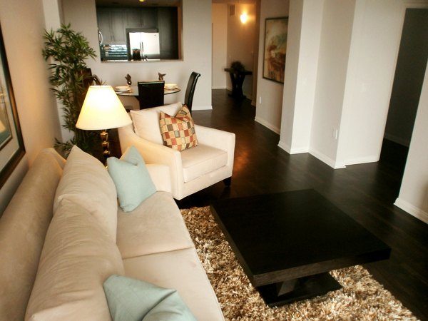 Spacious living room with modern decor in Legacy at Westwood Apartments
