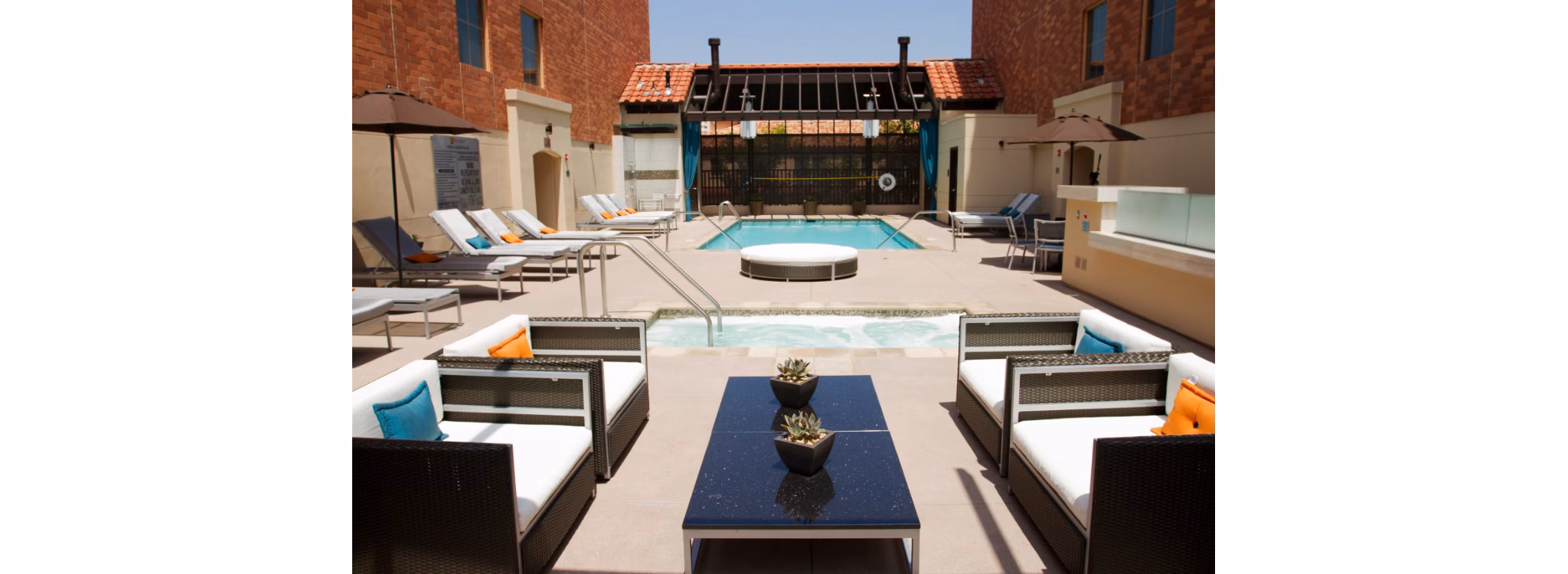 Chic patio area with modern seating at Legacy at Westwood Apartments, ideal for relaxation and socializing in a luxurious setting