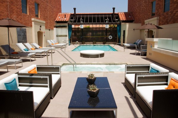 Chic patio area with modern seating at Legacy at Westwood Apartments, ideal for relaxation and socializing in a luxurious setting