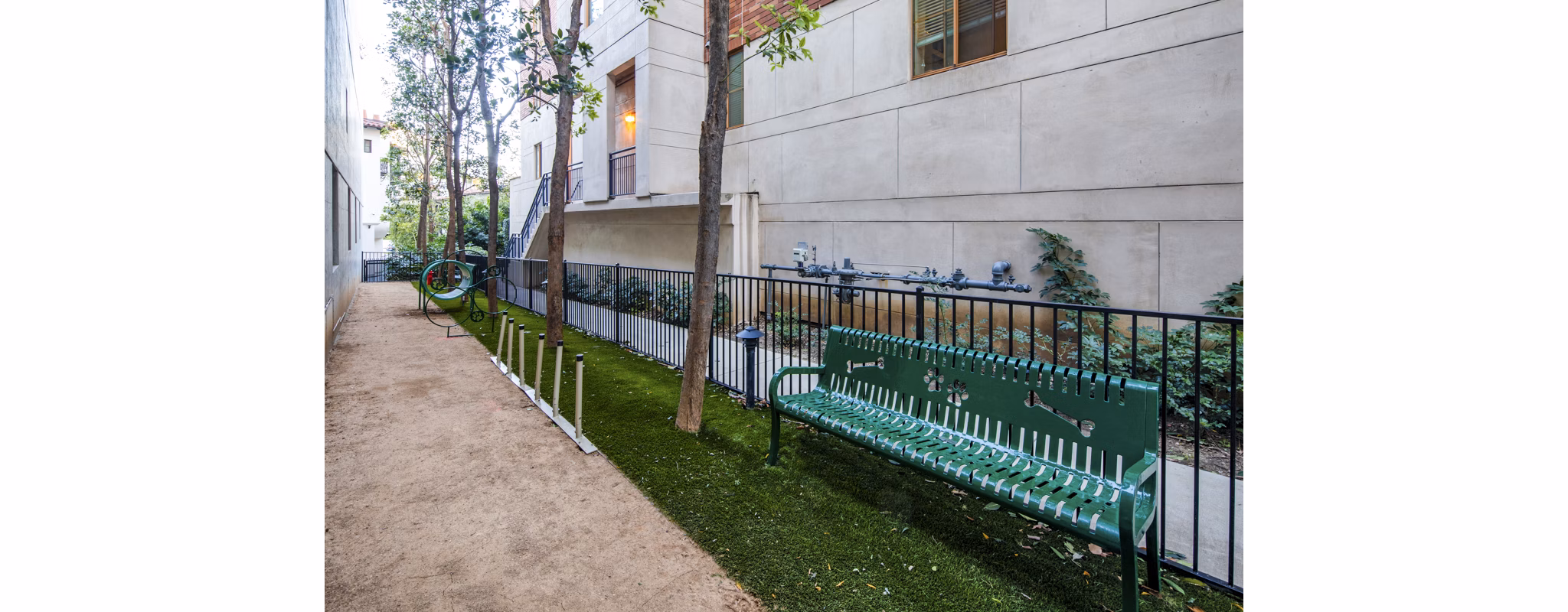 Spacious dog park with agility equipment at Legacy at Westwood Apartments