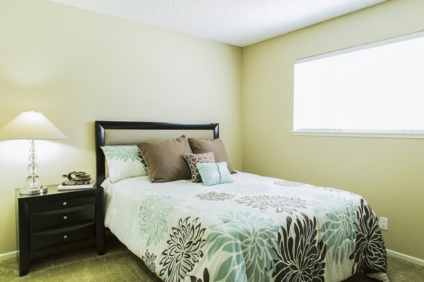 Cozy bedroom with elegant decor at Ventura Terrace Apartments