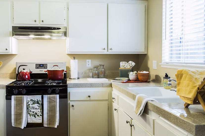 Modern kitchen with stainless steel appliances at Ventura Terrace Apartments, luxury living for culinary enthusiasts