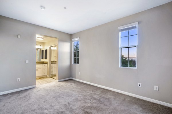 Cozy bedroom with modern decor at Rolling Hills Gardens Apartments