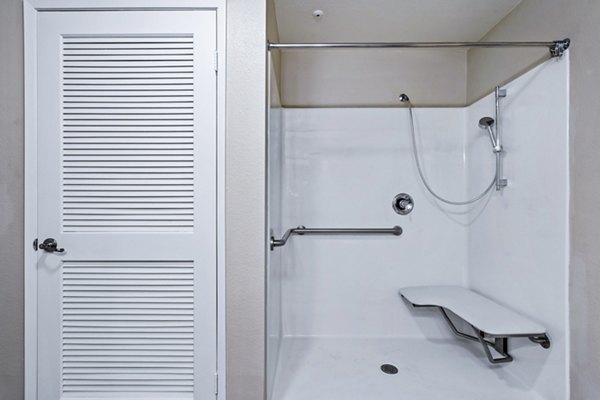 Modern bathroom with glass shower and sleek fixtures in Rolling Hills Gardens Apartments