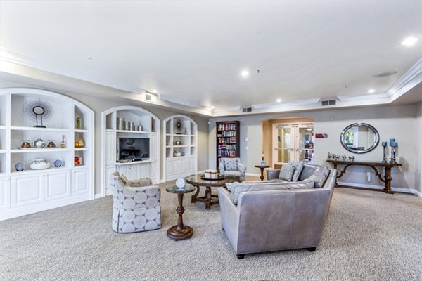Elegant clubhouse with modern dÃ©cor at Rolling Hills Gardens Apartments, perfect for social gatherings and leisure activities