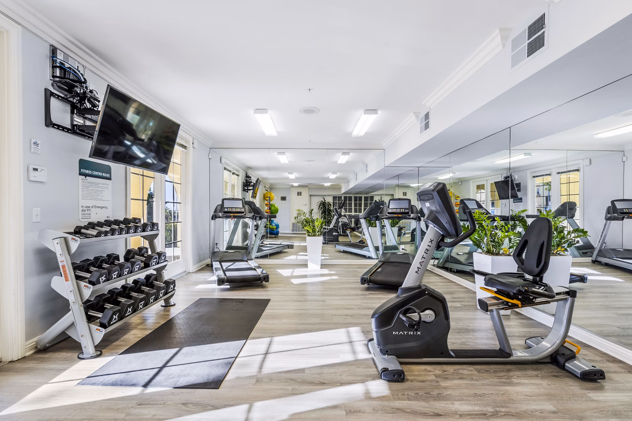 Modern fitness center with top-tier equipment at Rolling Hills Gardens Apartments