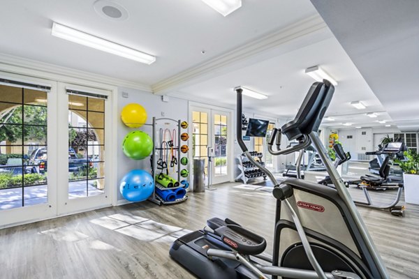 State-of-the-art fitness center with modern equipment at Rolling Hills Gardens Apartments, promoting an active lifestyle for residents